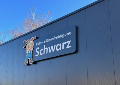 Firmengebäude Rohrreinigung Schwarz